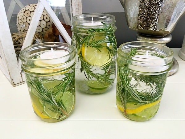 3 Mosquito Repellent Mason Jar Luminaries with lemon, lima, rosmemary, essential oils and water