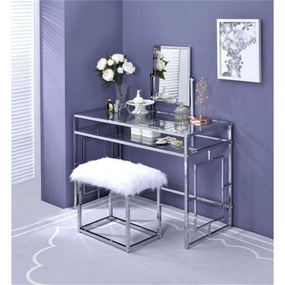 Glamorous vanity area with chrome furniture.