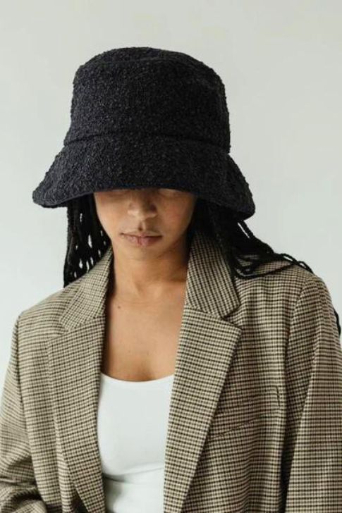 Bouclé and Shearling hat.