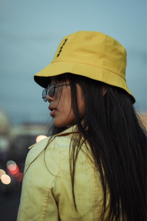 Yellow bucket hat for fall 2023.