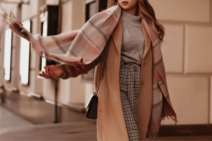 Grey Knitted Cozy Sweater, Scarf, Paid Pants & Brown Coat.