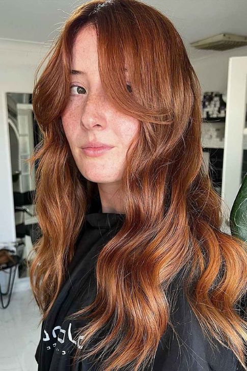 Long Curtain Bangs with Wavy Copper Hair