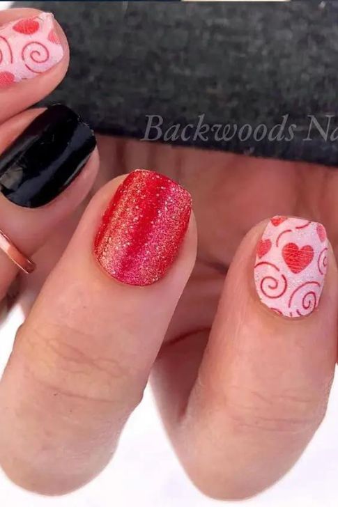 Short Nail Design Featuring Pink, Red Hearts, and Sparkle