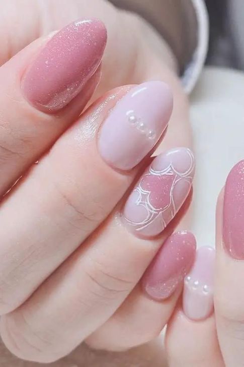 Short Almond Nails in Soft Pink with Heart Art