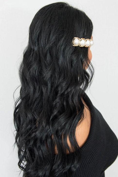Loose Curls With a Statement Hair Clip